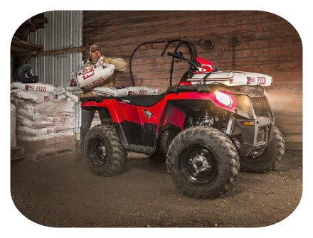 polaris utiltity atv hard at work on the farm